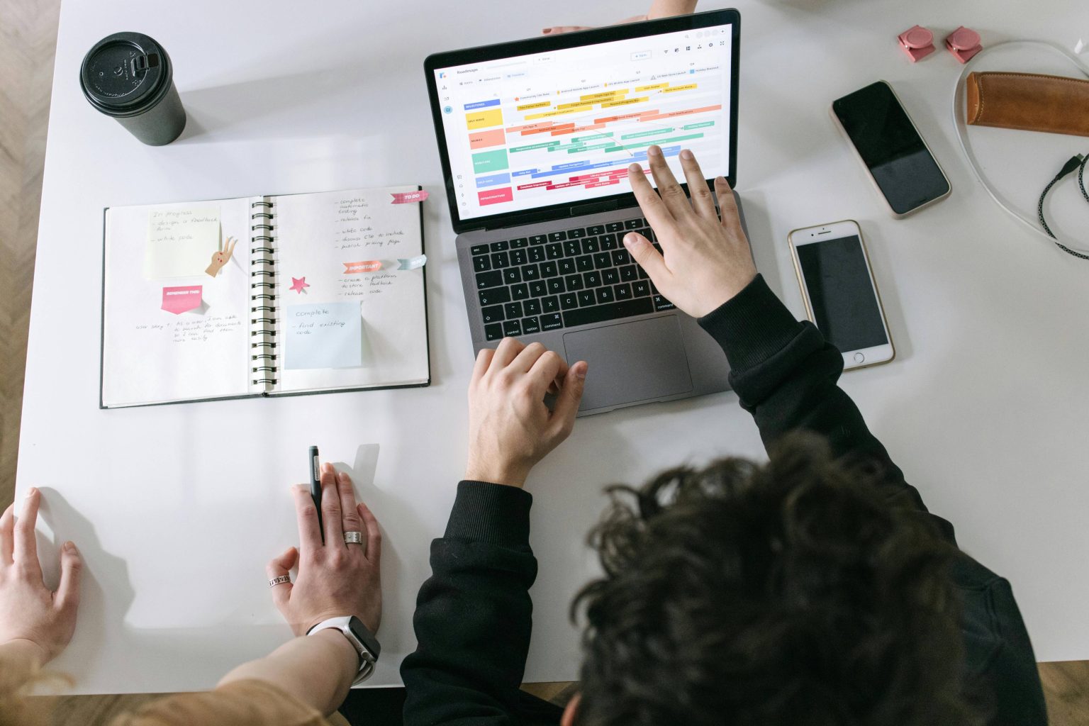 Accountant reviewing organized financial records on a desk